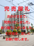建物全体の北面の外観・正面の玄関面