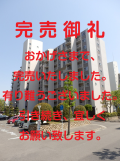 建物全体の北面の外観・正面の玄関面